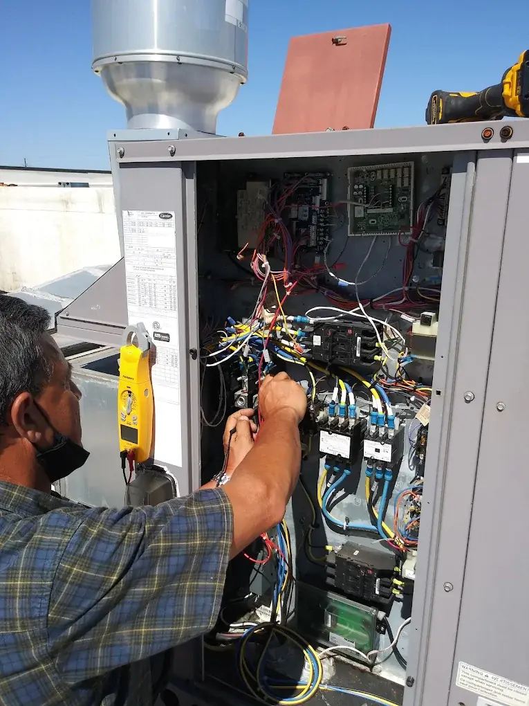 Henry working on HVAC system